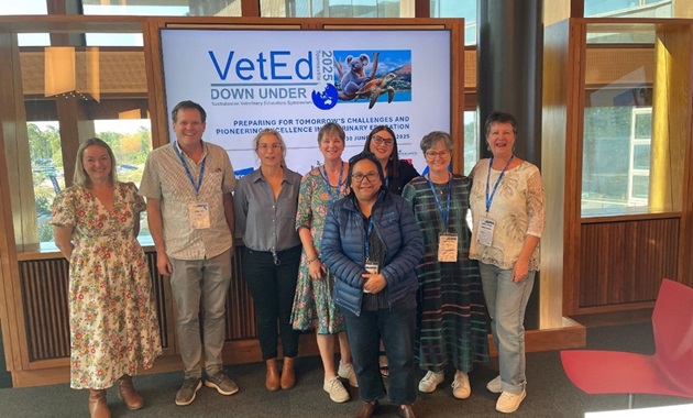Group of people in front of VetEd sign