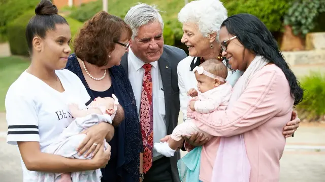 Family with babies and Rhonda Marriot, Fiona Stanley, Ken Wyatt