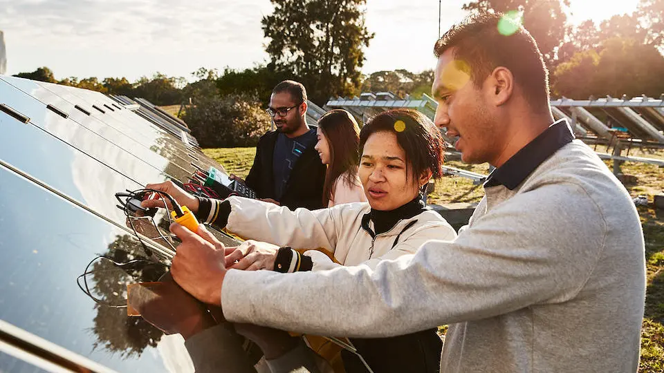 students and solar panel